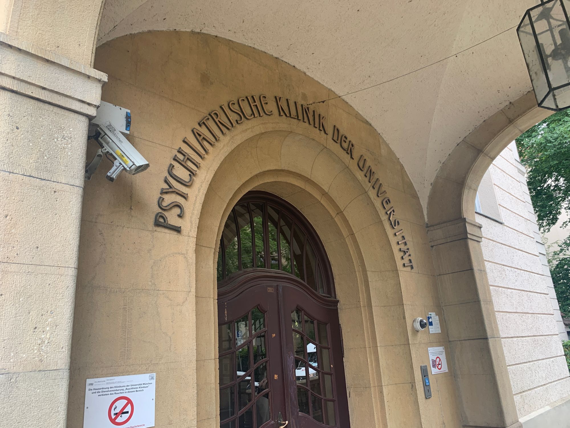 Outside the building where Alois Alzheimer's old lab is. The text above the door means " University Psychiatric clinic